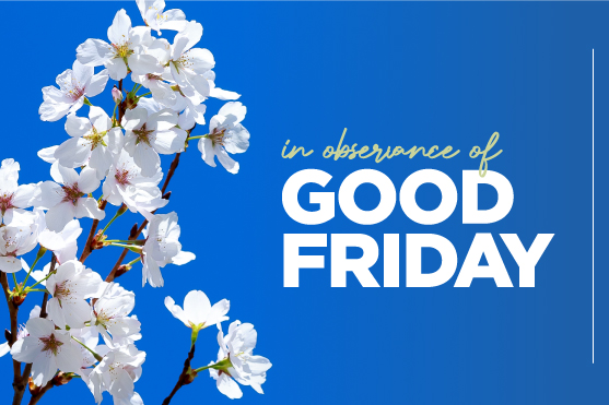 Spring flowers against the sky with text that says in observance of Good Friday
