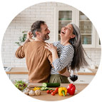 Happy couple dancing in the kitchen