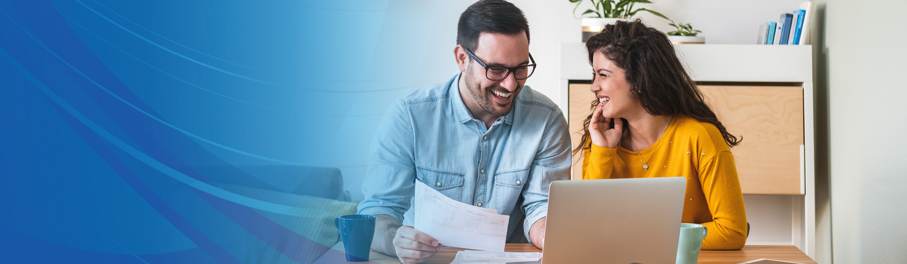 Man and woman looking at documents